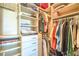 A walk-in closet with organizers providing ample space for clothes and accessories at 10 Via Visione # 103, Henderson, NV 89011