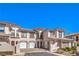 Charming townhome with well-maintained landscaping, offering a blend of comfort and curb appeal at 10 Via Visione # 103, Henderson, NV 89011