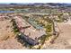 Beautiful multi-story home with a tile roof, located in a golf course community with lake views at 10 Via Visione # 103, Henderson, NV 89011