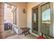 Cozy outdoor patio with comfortable seating, perfect for relaxing and enjoying the fresh air at 10 Via Visione # 103, Henderson, NV 89011