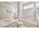 Bright bathroom features a large vanity and a tub/shower combination for a clean, fresh space at 10057 Bundella Dr, Las Vegas, NV 89134