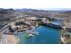 The luxury resort community features private docks, a lake, clubhouse, and mountain views at 18 Grand Corniche Dr, Henderson, NV 89011