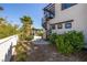 Beautiful backyard showcasing a spiral staircase, lush landscaping, and inviting outdoor seating area at 18 Grand Corniche Dr, Henderson, NV 89011