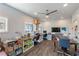 Bright and spacious craft room featuring multiple workstations and custom storage solutions at 18 Grand Corniche Dr, Henderson, NV 89011