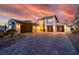 A beautifully designed home featuring a paver driveway and spacious three-car garage at 18 Grand Corniche Dr, Henderson, NV 89011