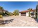 An expansive paver driveway leading to the beautiful garage at 18 Grand Corniche Dr, Henderson, NV 89011