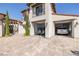 Spacious three-car garage showcasing ample parking and driveway space in a luxurious home at 18 Grand Corniche Dr, Henderson, NV 89011