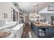 Bright kitchen with an oversized island, modern appliances, and barstool seating at 18 Grand Corniche Dr, Henderson, NV 89011