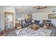 Spacious living room features a large sectional sofa, display cabinet, and lots of natural light at 18 Grand Corniche Dr, Henderson, NV 89011