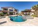 Stunning backyard oasis featuring a spacious pool, jacuzzi, and elegant outdoor seating area at 18 Grand Corniche Dr, Henderson, NV 89011