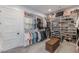 Spacious walk-in closet with ample shelving, hanging racks, and organized storage solutions at 18 Grand Corniche Dr, Henderson, NV 89011