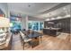 Modern kitchen and dining area with dark wood cabinets and a sleek island at 1900 Vero Dr, Las Vegas, NV 89134