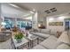 Open living space with a comfortable seating area and integrated dining and kitchen at 1900 Vero Dr, Las Vegas, NV 89134