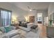 Bright main bedroom with modern decor, ensuite bathroom, and plush furnishings at 1900 Vero Dr, Las Vegas, NV 89134