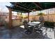 Covered outdoor seating area and bar, perfect for entertaining guests and enjoying the weather at 2279 Pacini Ct, Henderson, NV 89052