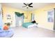 Bright and inviting bedroom with large windows, light floors, and cheerful decor at 2279 Pacini Ct, Henderson, NV 89052