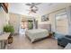 Comfortable main bedroom with patio access, neutral tones, and plenty of natural light at 2279 Pacini Ct, Henderson, NV 89052