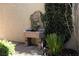 Outdoor water fountain with multiple tiers, adding a tranquil touch to the yard at 2279 Pacini Ct, Henderson, NV 89052