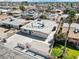 Expansive aerial view of single-story home with gated yard, modern roof, and well-maintained landscaping at 2729 Flower Ave, North Las Vegas, NV 89030