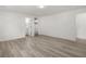 Spacious bedroom with wood-look flooring, ensuite bathroom and walk-in closet at 2729 Flower Ave, North Las Vegas, NV 89030