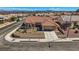 Desirable home boasts mature landscaping, a well-maintained yard, and an attached two-car garage at 2736 Darby Falls Dr, Las Vegas, NV 89134