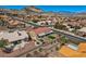 Aerial view showcases this lovely community with mountain views and well-maintained landscaping at 2736 Darby Falls Dr, Las Vegas, NV 89134