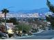 Night view of the Las Vegas strip and skyline over a residential neighborhood at 2736 Darby Falls Dr, Las Vegas, NV 89134