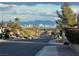 Day view of Las Vegas skyline over a residential neighborhood under a cloudy sky at 2736 Darby Falls Dr, Las Vegas, NV 89134