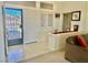 Foyer with tile flooring, an ornate security door, and access to other rooms at 2736 Darby Falls Dr, Las Vegas, NV 89134
