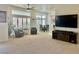 Bright living room with natural light, comfortable seating, and stylish decor at 2736 Darby Falls Dr, Las Vegas, NV 89134
