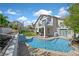 Inviting backyard pool and landscaped yard with an upper level balcony providing great views at 2875 Cooper Creek Dr, Henderson, NV 89074
