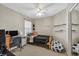 Cozy bedroom with a ceiling fan and neutral walls, perfect for a room at 2875 Cooper Creek Dr, Henderson, NV 89074