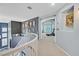 Upstairs hallway with framed art and wall decor at 2875 Cooper Creek Dr, Henderson, NV 89074