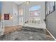 Bright and airy living room with soaring ceilings, large windows, and stylish decor, creating a welcoming atmosphere at 2875 Cooper Creek Dr, Henderson, NV 89074