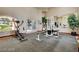 Spacious community gym with machines, free weights, a large mirror, and lots of light at 2975 Bluegrass Ln # 412, Henderson, NV 89074