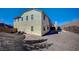 Home features a spacious backyard with rock wall, and a covered patio perfect for relaxing outdoors at 352 Sidewheeler St, Henderson, NV 89012