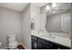 This half bath features modern fixtures, a sleek vanity, and neutral decor at 352 Sidewheeler St, Henderson, NV 89012