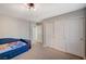 Cozy bedroom with closet space and neutral decor, perfect for relaxation at 352 Sidewheeler St, Henderson, NV 89012