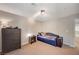 Bedroom featuring a comfortable daybed and chest of drawers at 352 Sidewheeler St, Henderson, NV 89012