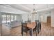 Dining area with views to living room and staircase at 352 Sidewheeler St, Henderson, NV 89012