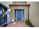 Home features a welcoming blue front door with sidelights and a brick-paved entrance at 352 Sidewheeler St, Henderson, NV 89012
