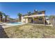 Backyard view showcasing the pool, patio, and well-maintained landscaping, perfect for outdoor activities and relaxation at 3577 Wayne Cir, Las Vegas, NV 89121