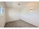 Carpeted bedroom with window and wall sconce lighting fixture at 3577 Wayne Cir, Las Vegas, NV 89121