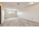 Large bedroom with plush carpeting, neutral walls and ample natural light at 3577 Wayne Cir, Las Vegas, NV 89121