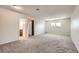 Bright bedroom with neutral paint, carpet flooring, and en suite bathroom access at 3577 Wayne Cir, Las Vegas, NV 89121
