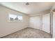 Bright bedroom features a window with outdoor views and a neutral color palette at 3577 Wayne Cir, Las Vegas, NV 89121
