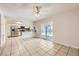 Bright dining/living area with tile floors and sliding glass doors to the backyard at 3577 Wayne Cir, Las Vegas, NV 89121