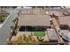 Extensive backyard featuring desert landscaping, putting green, and covered patio at 3662 Riley Ann Ave, Las Vegas, NV 89139