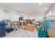 Large bonus room with natural lighting, tile floors, and an air conditioning unit at 3662 Riley Ann Ave, Las Vegas, NV 89139