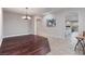 Open-concept living room featuring hardwood floors and tiled floors at 3662 Riley Ann Ave, Las Vegas, NV 89139